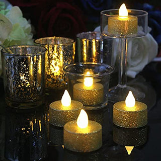 LOGUIDE Battery Operated LED Tea Lights,24 Pack Gold Flameless Votive Tealights Candle with Warm White Flickering light, Small Electric Fake Tea Candle Realistic for Wedding,Table,Festival Celebration